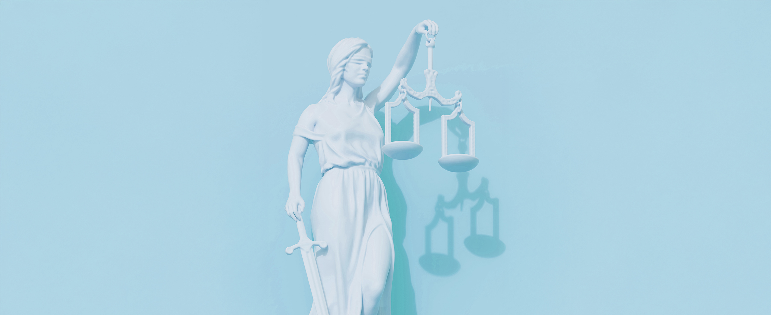 The goddess Themis holding the scales of justice and a sword.