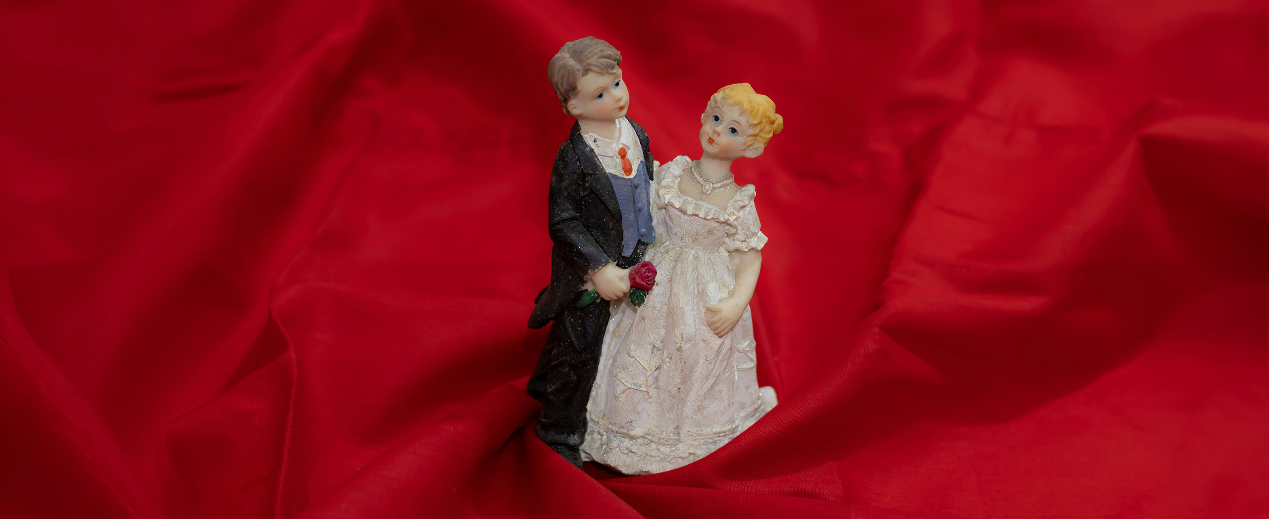 A vintage bride and groom figurines.