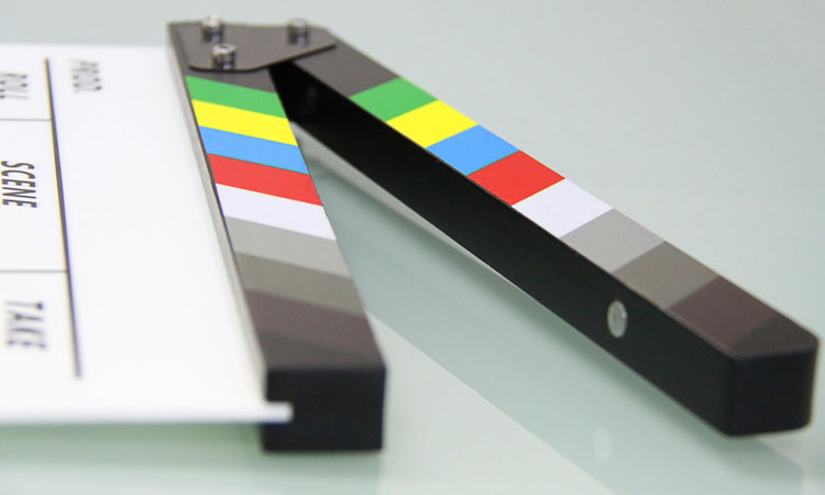 Movie clapboard open on a table