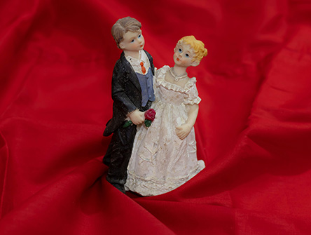 A vintage bride and groom figurines.