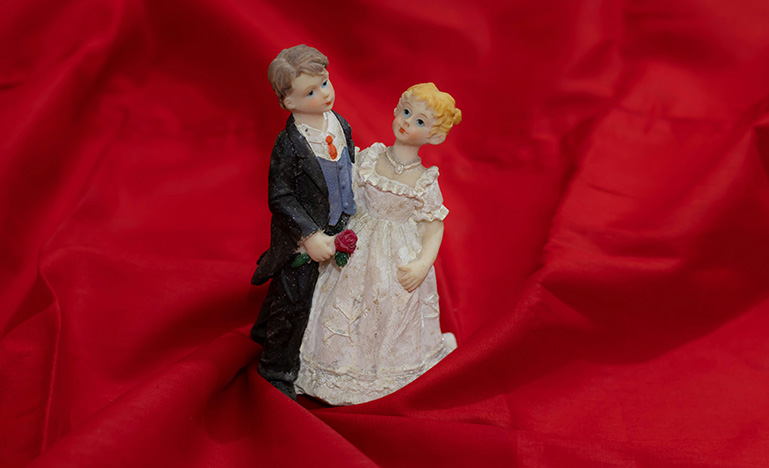 A vintage bride and groom figurines.