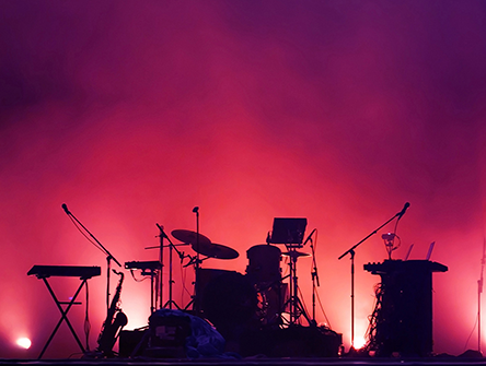 An concert stage with a full set of instruments. 
